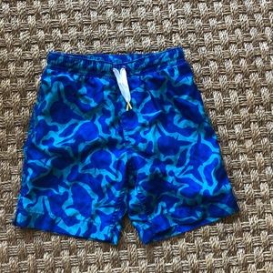 Lands’ End Boys swum trunks. Size M (5-6)